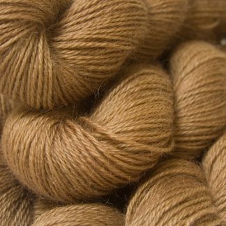 Semi-solid light brown, with oakwood and tawny tones hand-dyed Wensleydale DK/ Double Knit yarn. Hand-dyed by Triskelion Yarn