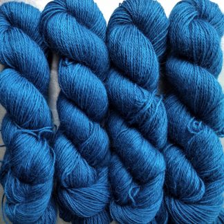 Ælfred - Mid-toned royal blue hand-dyed Wensleydale DK/ Double Knit yarn. Hand-dyed by Triskelion Yarn