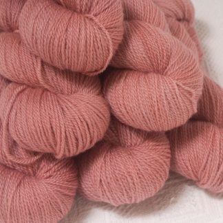 Ash Rose - Light greyish pink Bluefaced Leicester 4-ply / fingering weight yarn hand-dyed by Triskelion Yarns