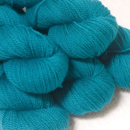 Fiachra - Mid-tone turquoise Bluefaced Leicester sport weight yarn hand-dyed by Triskelion Yarns