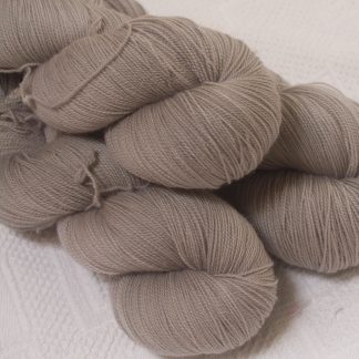 Pebble - Pale greyish brown extra fine Falklands Merino 2-ply laceweight yarn hand-dyed by Triskelion Yarn