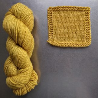 Indian Summer - Light sunny yellow Bluefaced Leicester worsted weight yarn hand-dyed by Triskelion Yarn