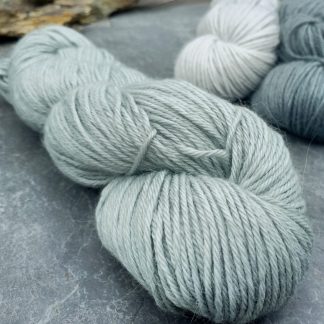 Rain-washed – Light grey with a dusty aqua undertone baby alpaca double knit (DK) yarn. Hand-dyed by Triskelion Yarn