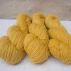 Sol - Light sunny yellow 4-ply/fingering Peruvian Highland wool sock yarn. Hand-dyed by Triskelion Yarn.