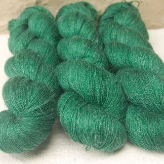Nemeton - Mid-tone emerald green Baby Alpaca, silk and linen heavy laceweight yarn. Hand-dyed by Triskelion Yarn.