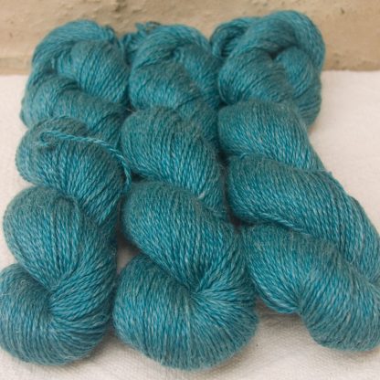 Fiachra - Mid-tone turquoise Baby Alpaca, silk and linen sport weight yarn. Hand-dyed by Triskelion Yarn.