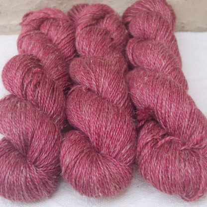 Rose - Vibrant deep rose Baby Alpaca, silk and linen sport weight yarn. Hand-dyed by Triskelion Yarn.