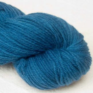 Fishingboatbobbing Sea - Semi-solid dark blue, with cobalt, sea iblue and dark grey tones organic Merino DK/ Double Knit yarn. Hand-dyed by Triskelion Yarn