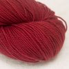 Tea Rose - Deep red extra fine Merino 4-ply / fingering weight yarn. Hand-dyed by Triskelion Yarn.