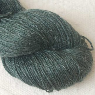 Boreal – Dark spruce green Baby Alpaca, silk and linen 4-ply yarn. Hand-dyed by Triskelion Yarn.