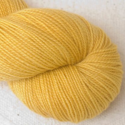 Indian Summer - Light sunny yellow Corriedale 4-ply/fingering weight yarn. Hand-dyed by Triskelion Studio.