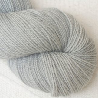 Tern - Pale cool grey Corriedale 4-ply/fingering weight yarn. Hand-dyed by Triskelion Studio.