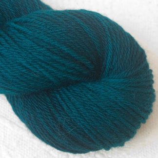Llŷr - Dark blue green Corriedale heavy DK/worsted weight yarn. Hand-dyed by Triskelion Studio.