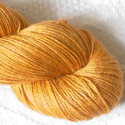 Anemone - Apricot orange Baby Alpaca, silk and linen 4-ply yarn. Hand-dyed by Triskelion Yarn.