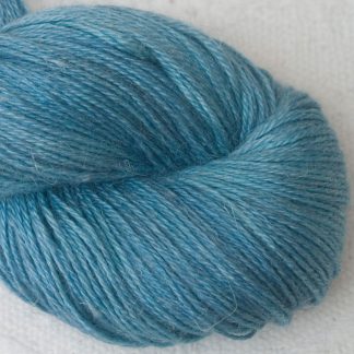 Hama's Hall - Semi-solid light sky blue, with powder blue and grey tones Baby Alpaca, silk and linen 4-ply yarn. Hand-dyed by Triskelion Yarn.