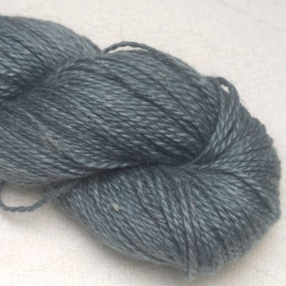 Graphite - Mid to dark grey Baby Alpaca, silk and linen Mid-toned blue violet light DK yarn. Hand-dyed by Triskelion Yarn.
