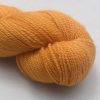 Anemone - Light orange with a yellow undertone Bluefaced Leicester 4-ply / fingering weight yarn hand-dyed by Triskelion Yarns