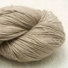 Biscuit - Light brownish beige Merino and silk blend 4-ply / fingering weight yarn. Hand-dyed by Triskelion Yarn.
