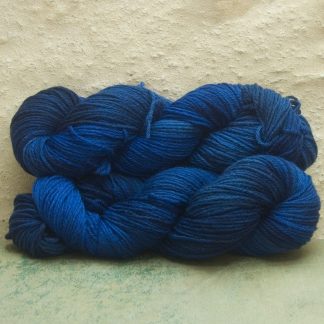 Midnight at the Oasis – Variegated midnight blue and royal blue organic Merino DK/ Double Knit yarn. Hand-dyed by Triskelion Yarn organic Merino DK/ Double Knit yarn. Hand-dyed by Triskelion Yarn