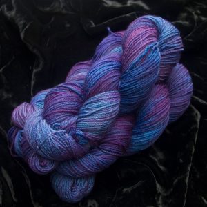 Nebula - Blue, purple and violet variegated superwash British Bluefaced Leicester sportweight yarn. hand-dyed by Triskelion Yarn